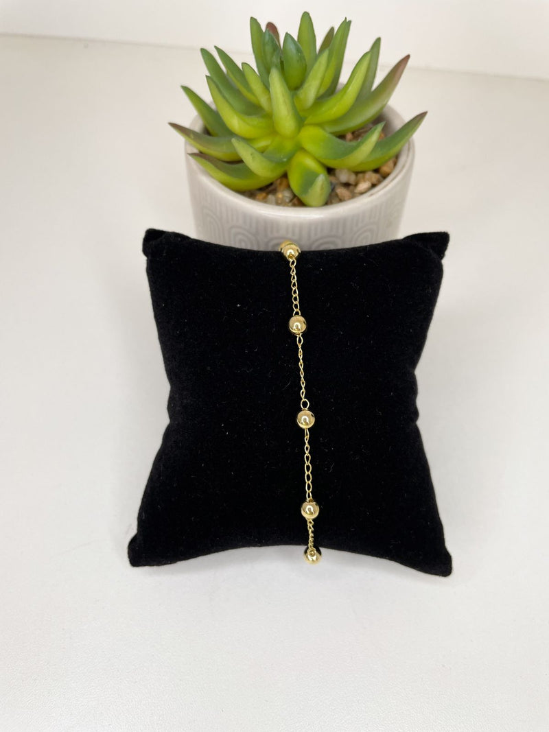 Pulseira dourada mini bolas